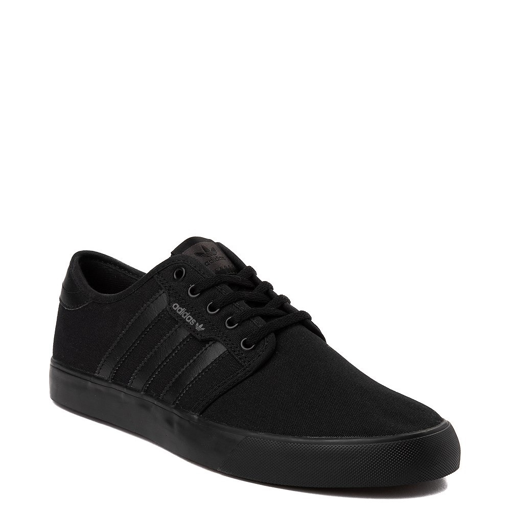 all black adidas seeley skate shoes
